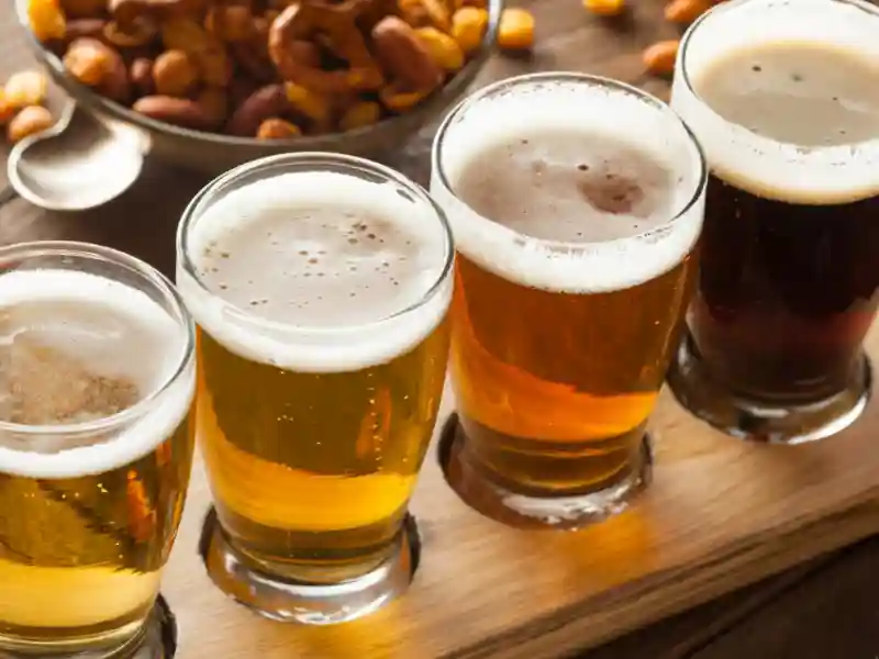 Assorted beers in a flight ready for tasting